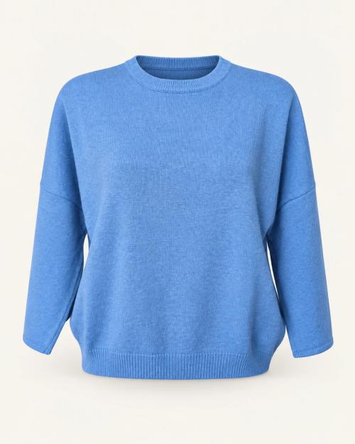 Maglia azzurra dalla linea morbida